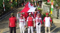 Kirab Bendera 81 Meter Meriahkan HUT ke-81 RI di Desa Pasuruan Lampung Selatan